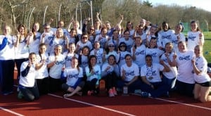 The women's track and field team celebrates its MASCAC title. (Courtesy of Westfield State Sports)
