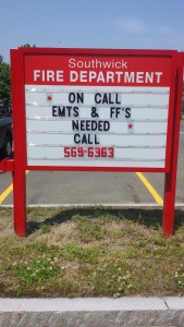 Sign in front of Southwick Fire Department seeking EMT's and firefighters. (Photo by Dan Desrochers)