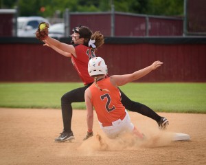 Westfield second baseman Elizabeth Irwin stretches to try and get the out on Agawam’s Rachel Lapponese. (Photo by Marc St. Onge)