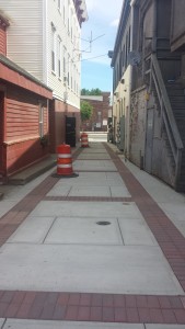 Back alley, behind Alternative Furniture, Whip City Music and other businesses.
