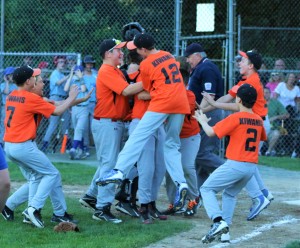 The Kiwanis celebrate a City Cup Championship Tuesday night. (Photo by Kellie Adam)