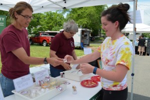 Karissa Foley of Westfield samples Strawberry Skyr at the Mayval Farm tent at the Westfield Farmers' Market.