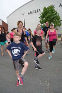 Jenna Garvey and her boys, Finn and Kaden, participate in the weekly free program, Run Your Health, that leaves from the Amelia Park Arena.