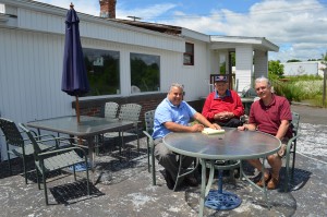 Stephen Fedus, Jr., center, is seen with his sons, Henry and Stephen 3rd, in front of the soon-to-be-opened Blue Boy Ice Cream on College Highway in Southwick. Fedus recently received the prestigious "Police Cross" from the West Hartford Police Department for his demonstrated sacrifice and bravery during an incident in 1948.