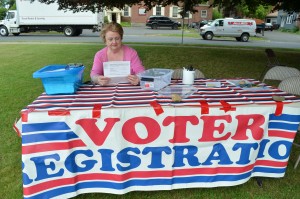 A voter registration table is featured every Thursday at the Westfield Farmers' Market on the grounds of the Episcopal Church of the Atonement on Court Street. Helen Mahler, above, reminds city residents that the deadline to register for the Sept. 8 primary is Aug. 16 and the deadline to register for the Nov. 8 general election is Oct. 19. Mahler, an election worker since 1984, noted it only takes a couple of minutes to complete a form which can be left with her or mailed to Westfield City Hall.