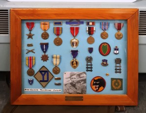 Also recognized at the Huntington Town Meeting on Monday was James Joyal, brother of Huntington resident Lori Belhumeur who brought his medals for display. In the center is the Purple Heart. (Photo by Amy Porter)