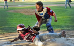 Westfield National catcher Jake Jachym looks for the call on a close play at home plate against Easthampton Thursday night at Papermill Field. (Photo by Kellie Adam)