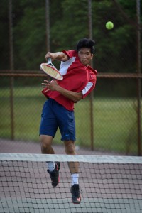 Westfield's Lyle Libanan delivers one of his finest efforts of the season Thursday against Minnechaug in a tournament match. (Photo by Marc St. Onge)