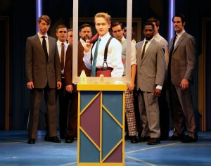 Riley Costello and the ensemble in How to Succeed... through June 12 at Connecticut Repertory Theatre. Photo by Gerry Goodstein.