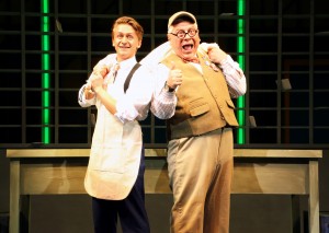 Riley Costello and Steve Hayes the ensemble in How to Succeed... through June 12 at Connecticut Repertory Theatre. Photo by Gerry Goodstein.