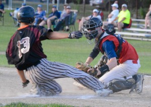 Westfield attempts to tag out Ludlow at a close play at the plate. (Photo by Chris Putz)