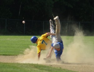 St. Mary's Shaun Gezotis knocks Pathfinder's second baseman off his feet with a hard slide into second base during Thursday's postseason at Westfield Middle School North. (Photo by Kellie Adam)