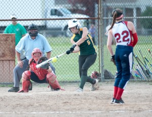 Southwick's Victoria DellaGiustina hits one right on the button during the team's big fifth inning in a playoff game against visiting Frontier. (Photo by Bill Deren)