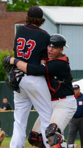 Westfield junior catcher Anthony Clark, right, picks up Bombers starting pitcher Ryan Towle (23) after Towle tossed a complete game victory. (Photo by Chris Putz)