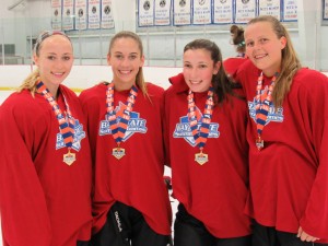 Local skaters, pictured from left to right, Mackenzie Pelletier, Maddie Pelletier, Bailey Tymeson, and Katie Neilsen represented Central-West at a recent girls’ ice hockey tournament. (Submitted photo)
