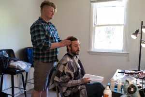 Hair and makeup artist Dan Koye is seen with actor James McMenamin prior to shooting a scene recently in Sandisfield. (Peter Baiamante photography)