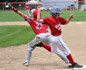 Westfield National's Ethan Porter just barely beats out the throw at first against Pittsfield in a Little League Baseball 10-11-Year-Old All-Stars sectional game Sunday at Papermill Field. (Photo by Kellie Adam)