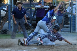 Westfield catcher Alex LaCourse attempts to make the play as an Amherst base runner slides into home plate during Friday's Little League Baseball 11-12-Year-Old All-Stars district championship at Ralph E. Sanville Field on Cross Street. (Photo by Kellie Adam)