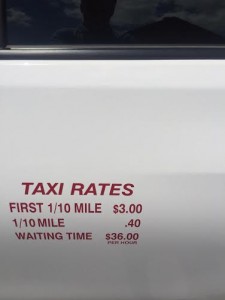 Michael's Taxi has their rates right on the side of the taxi for their customers. (Photo by Greg Fitzpatrick)