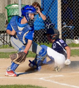 Leominster National attempts to score at home plate against Westfield American in a Little League Baseball sectional game Thursday night. (Photo by Chris Putz)