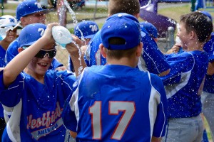 Players for Westfield American celebrate a championship with a splashing good time. (Photo by Chris Putz)