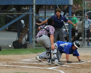 Westfield American's Jeremy McCormick slides in safely at home plate against Amherst. (Photo by Kellie Adam)
