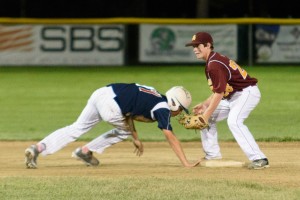 Atlantic Shores (N.J.) attempts to keep Sarasota (Florida) in check on the base paths late Monday night at Bullens Field. (Photo by Marc St. Onge)