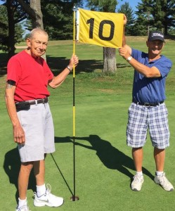 Bob Generoux (left) stands on the 10th green with East Mountain Country Club Golf Professional Ted Perez Jr. (right) (Photo by Greg Fitzpatrick