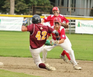 Brian Furey makes the attempt to avoid the tag from Tri County. (Photo by Kellie Adam)