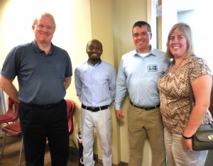 WPS Superintendent Stefan Czaporowski (3rd from left) with city IT technicians Steve Zawada, Baraka Baraka and Lenore Bernashe. Both public school and city employees were invited to the open house. (Photo by Amy Porter)