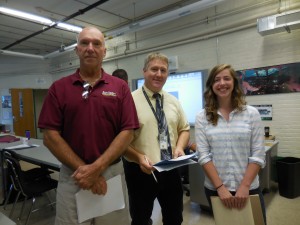 (L-R) AMT Advisory Board member Tom Trudeau, FAA inspector Kevin P. Godbout and new AMT assistant instructor Krysten Renihan at the inspection on Wednesday. (Photo by Amy Porter)