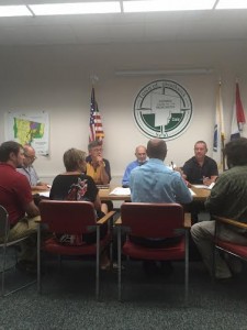 The partial business owners of New England Disc Golf Center discuss their thoughts with the Conservation Commission. (Photo by Greg Fitzpatrick)