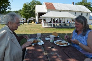 Gail Beaudoin of Springfield and her daughter Peggy Bannish of Southwick enjoy a polish dinner from The Polish Hut at the Blandford Fair on Sunday.