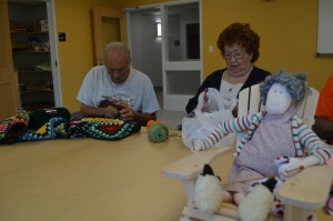 Fred Nason and Carol Griggs were among the local residents who took part in the Sassy Stitchers Knit & Crochet group on Wednesday morning at the Westfield Senior Center. "Sassy" the mascot with needles in hand is always part of the table décor.
