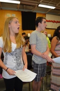 Westfield High School freshmen Ally Carnes and Justin Misseri sing their parts to "Masquerade" during Friday's rehearsal.