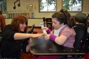 During a break in rehearsal, Amanda Dalton is given instruction by her nurse Barbara Goshea.