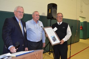 Daniel Burack receives the President's Award from Boys & Girls Club of Greater Westfield Board President Mike Coffey and Bill Parks, executive director.