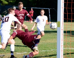 A Lions’ player cuts in to make a save against Westfield. (Photo by Chris Putz)