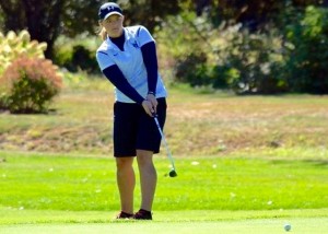 Maddy Atkocaitis putts from just off the green on the 18th hole. (Photo courtesy of Westfield State University Sports)