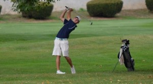 Nick Eliopoulos hits his second shot on the 10th hole. (Photo courtesy of Westfield State University Sports)