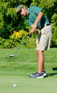 Southwick golfer James Longhi putts from the second hole Thursday against St. Mary at Edgewood Country Club. Longhi shot yet another excellent round of golf to help lead the Rams to victory. (Photo by Chris Putz)