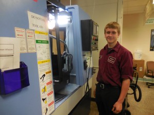 Junior Michael Michonski, at the CNC machine, wants to be a mechanical engineer, and fix the high tech machines. (Photo by Amy Porter)