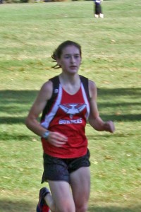 Westfield's Sophie Gronbeck runs to a first-place finish in a girls' cross country race against Ludlow Tuesday at Stanley Park. (Photo by Serena LaClair)