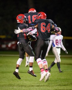 Westfield celebrates the first of several touchdowns scored in a 44-0 blowout of West Springfield Friday night at Bullens Field. (Photo by Marc St. Onge)