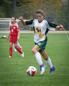 St. Mary's Allie Goodreau dribbles the ball en route to scoring a goal Thursday against Commerce at Westfield Middle School North. (Photo by Marc St. Onge)