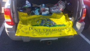 The Gadsden flag signed by mourners. 