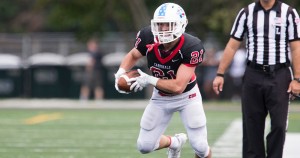 Senior slot receiver Billy Smith (of Westfield) races up the field with the ball for the Catholic University of American football team. Smith scored his first touchdown of the season Sunday against Washington & Lee. (Photo courtesy of CUA Cardinals Sports) 