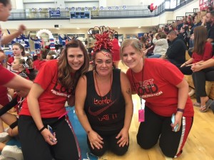 Cheering on the Westfield Youth Cheer squads were Junior coach Amy Lefebvre, Christine Medina, and Junior coach Shelley Coach.