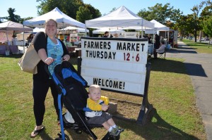 Samantha Cowles of Southwick is all smiles - with son Oliver - as she wraps up her weekly shopping at the Westfield Farmers' Market.