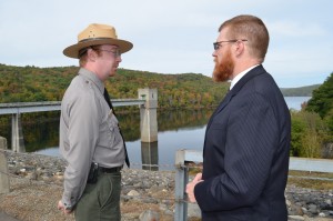 Matthew Coleman, project manager for Littleville Lake and Knightville Dam, reviews the logistics with Steven Lehmann, basin manager, Lower Connecticut River Basin, U.S. Army Corps of Engineers, New England District, prior to a special ceremony on Saturday morning at Littleville Dam.